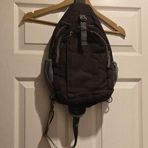 Unisex  Black  Sling Backpack w multiple pockets